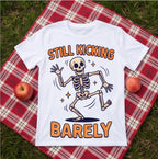 Still Kicking Barely Dancing Skeleton Funny Shirt, Over the Hill Gift T-shirt lifestyle photo in White #color:white;